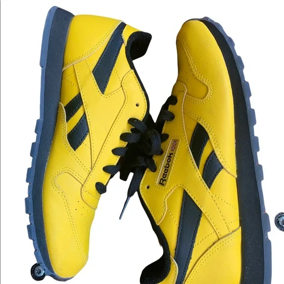 Yellow classic Reebok size 5